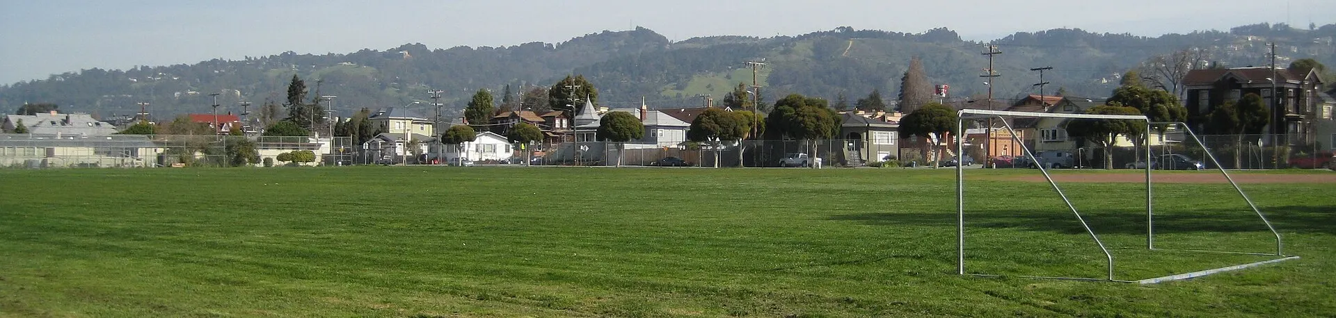 Panorama of Bushrod Park’s ball fields and soccer fields with houses and the East Bay hills behind