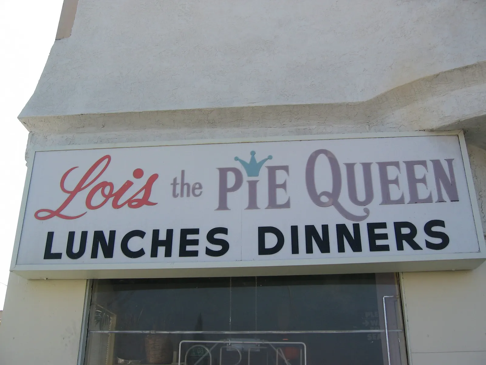 Close-up of the Lois the Pie Queen sign
